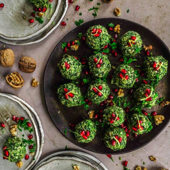 Blanched Spinach and crushed walnuts wrapped with blue fenugreek, sweet paprika, lemon and vinegar; vegan raw Georgian Spinach Walnut Balls (Pkhali) recipe, a vegan condiment, paleo too. Edward Daniel ©.