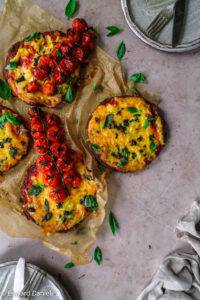 Oozing smelted cheese and an olive oil tomato sauce on a pillowy teff millet pastry base; Vegan gluten-free Margherita Pizza recipe, Italian cuisine. Edward Daniel ©.