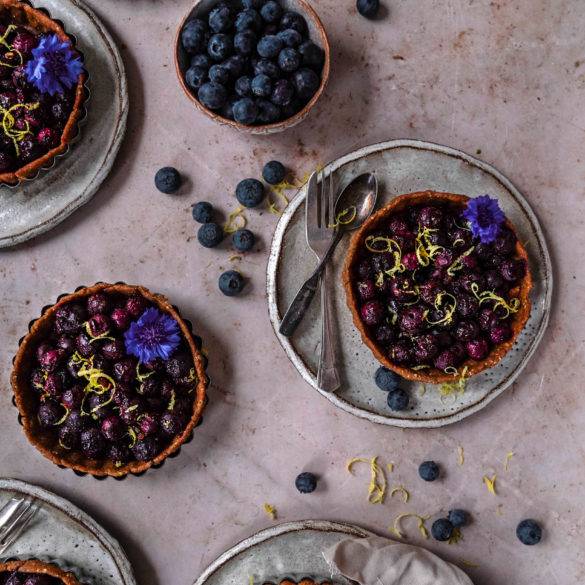 Succulent tangy burst Blueberry Pie recipe; pie infused with citrus lemon and earthy cinnamon on a millet teff pastry bed. Edward Daniel ©.
