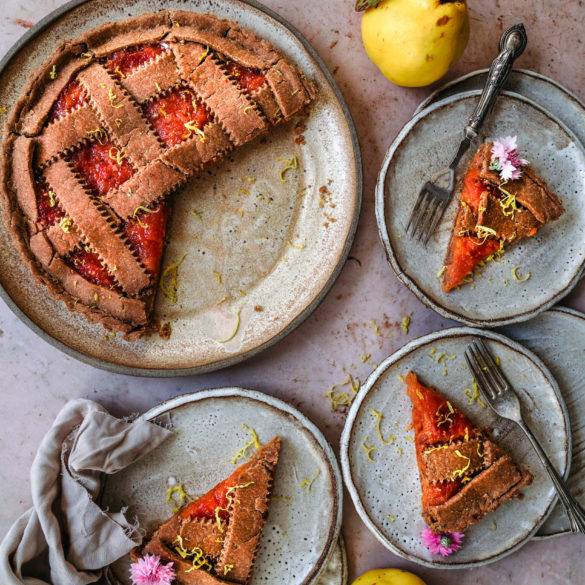 Golden pinkish floral vegan gluten-free Quince Crostada recipe, Italian cuisine; with citrus lemon in a millet teff pastry served with lashings of ice cream. Edward Daniel ©.