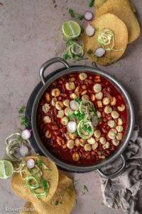 Fiery fleshy chewy hominy with lashings of pinto beans, garlic, cumin, oregano, bay leaves and Mexican chilis; Pozole Rojo recipe. Edward Daniel ©.