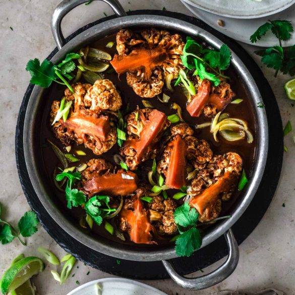 Vegan Cauliflower Adobo recipe; tenderised cauliflower flesh in a soy, vinegar, garlic, chili, coconut sauce, topped with lime, coriander and scallions. Edward Daniel ©.