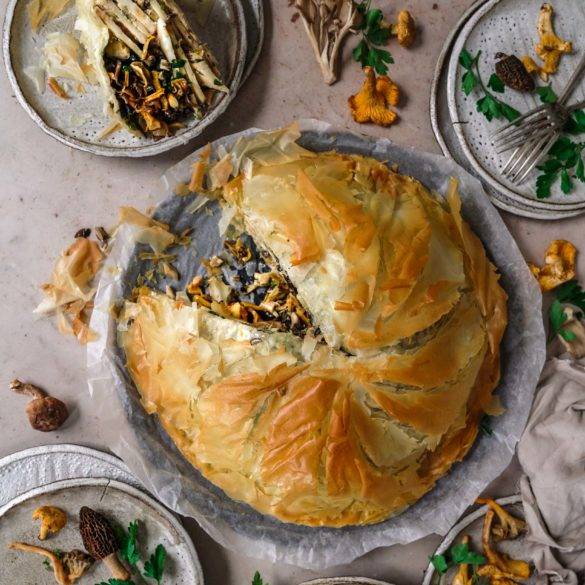 Vegan Celeriac Wild Mushroom Pithivier recipe; wild mushroom parsley on a celeriac thyme marjoram porcini almond cream bed encased in crisp puff pastry. Edward Daniel ©.