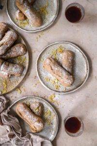 Vegan gluten-free Sponge Fingers aka Lady Fingers/ Savoiardi recipe; sweet dry vanilla sponge cakes biscuits, with walnuts and dusted with icing sugar. Edward Daniel ©.