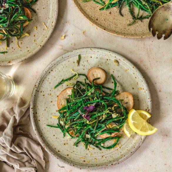 Mineral rich freshly foraged Blanched Marsh Samphire with citrus lemon and sliced garlic lightly sauteed in creamy butter. Edward Daniel ©.