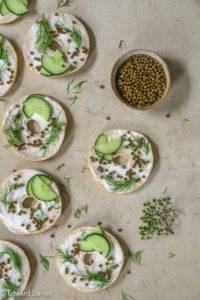 Raw burst crunchy nutty pickled green Elderberry Capers marinated in salty sweet white wine vinegar. Edward Daniel ©.