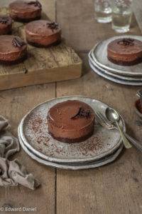 Velvety smooth chocolatey flavoured filling atop a nutty chocolate digestive crust garnished with chocolate shavings; Chocolate Cheesecake. Edward Daniel ©.