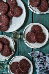 Crisp oat almond cocoa unleavened baked biscuits with a hint of bitter blackstrap molasses; Chocolate Digestives. Edward Daniel ©.
