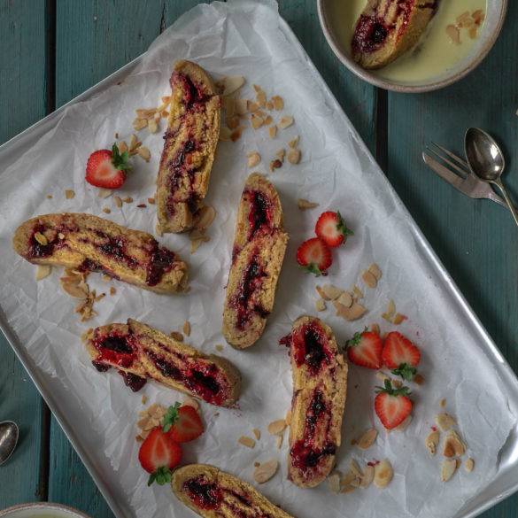 Steamed baked pillowy sorghum rice rolled pastry layered with sweet treacly burst fruit preserve; Jam Roly-Poly. Edward Daniel ©.