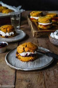 Plump golden orange sultanas wrapped in cushiony moist flaky buttery millet, oat and rice Scones perfect with jam. Edward Daniel ©.