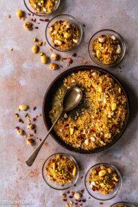 Warming flaky semolina with heat-generating flame of the forest and edible gums, cardamon, lotus and melon seeds, and toasted nuts; Panjiri. Edward Daniel ©.
